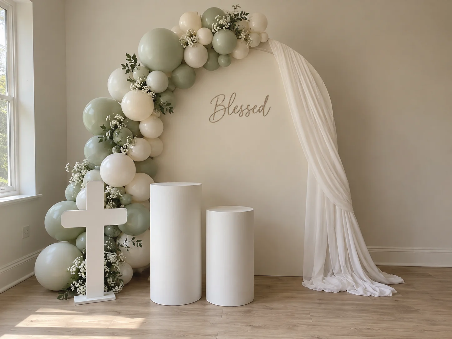 Blessed in Ivory balloon arch, backdrop and plinth styling concept